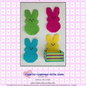 May include: A set of four colorful, plastic canvas Easter bunny coasters. The coasters are green, pink, blue, and yellow, with black dot eyes. One yellow bunny coaster sits in a striped holder. The text "0614 Peeps Coaster Set" is at the top.