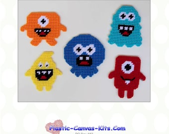May include: Five colorful monster magnets with different expressions. The magnets are made of plastic canvas and are perfect for adding a fun touch to any refrigerator or metal surface.