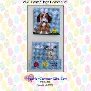 May include: A set of two plastic canvas coasters featuring Easter dogs wearing bunny ears. The coasters are blue with white clouds and feature a brown dog and a gray dog. The coasters are surrounded by a pattern of colorful Easter eggs.