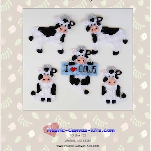 May include: A set of five plastic canvas cow magnets. The magnets feature black and white cows with pink noses and black eyes. One cow is holding a sign that says "I ♥ COWS".