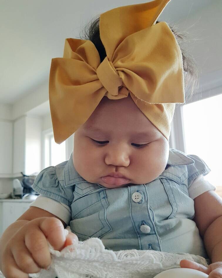 mustard baby bow
