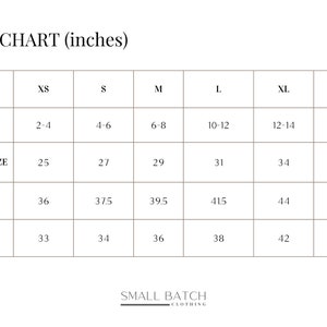 May include: Size chart for unisex clothing in inches. The chart shows sizes XS through XXL with corresponding US sizes, waist, hip, and bust measurements.