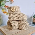 Born in 2026 2027 Baby Booties, Crochet Newborn Shoes, Handmade Infant Slippers, Baby Shower Gift, Pregnancy Announcement Keepsake Present product logo
