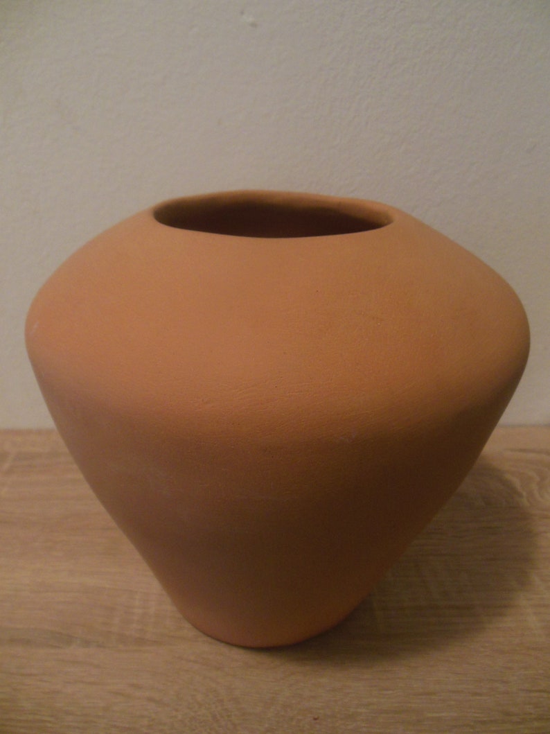 Unique hand build pottery jar.