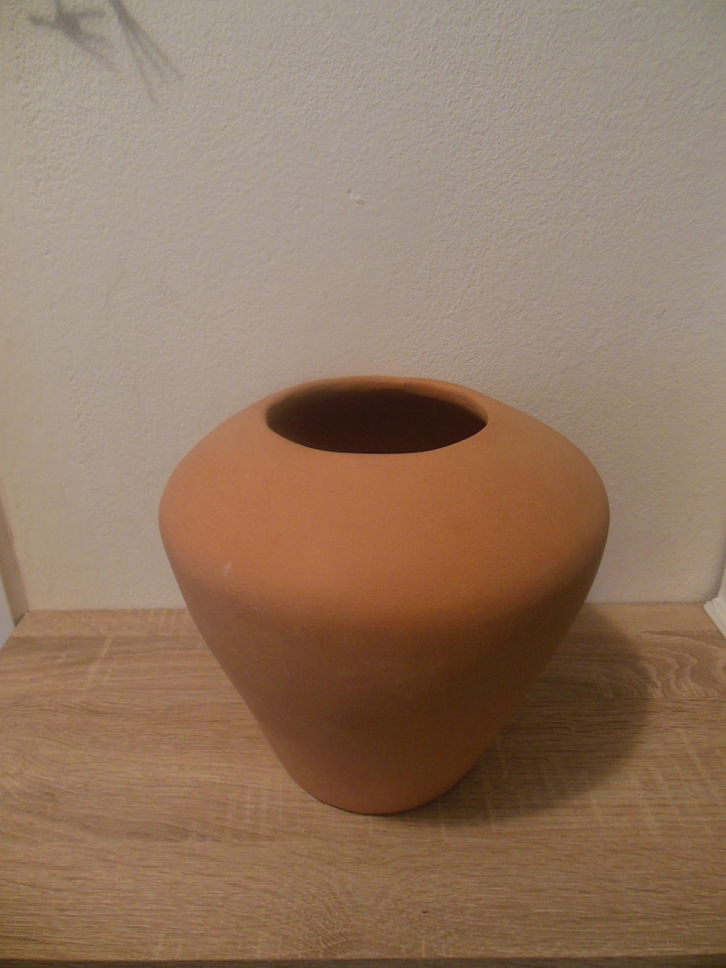 Unique hand build pottery jar.
