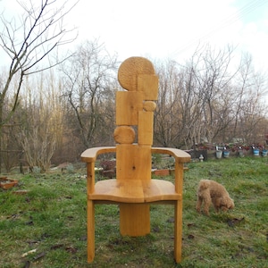 Unique  armchair in oak wood  signed and numbered.