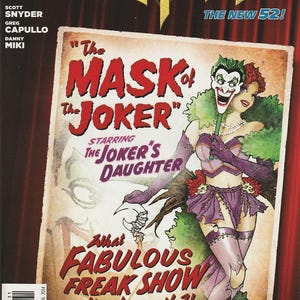 May include: A Batman comic book issue 32 featuring a cover illustration of the Joker's Daughter holding a Joker mask. The text reads The Mask of the Joker, Starring The Joker's Daughter, and What Fabulous Freak Show lies beneath?!