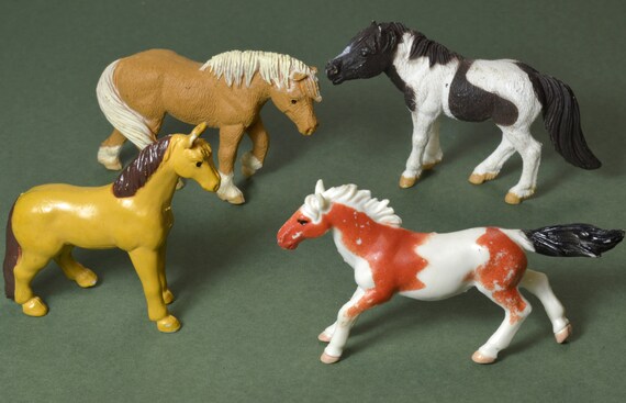 small plastic horses