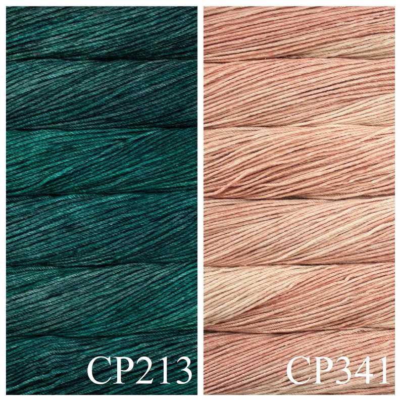 May include: Two skeins of yarn, one is a deep teal green colour and the other is a light peach colour. The skeins are labelled CP213 and CP341.