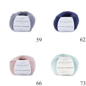 May include: Four balls of yarn in different colors: gray, blue, pink, and light blue. Each ball has a white label with the text "CONCEPT by KATIA COTTON-CASHMERE".