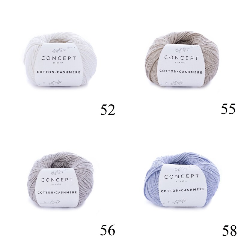 May include: Four skeins of yarn in different colors: white, beige, gray, and light blue. Each skein has a label that reads "CONCEPT by Katia COTTON-CASHMERE".