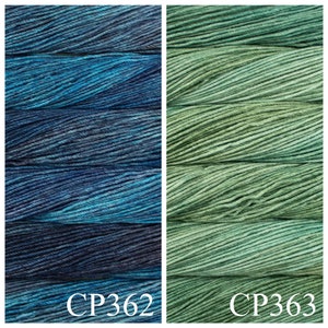 May include: Two skeins of yarn, one blue and green, and one green. The skeins are labelled CP362 and CP363.