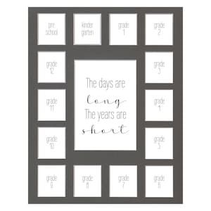 May include: A gray picture frame with 12 openings for photos. The openings are labeled with the grades from pre-school to grade 12. The frame has a quote in the center that reads "The days are long, The years are short."