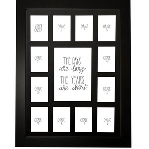 May include: Black picture frame with 12 openings for photos. The openings are labeled with the grades from Kindergarten to 8th grade. The center opening has the text "The days are long, the years are short".