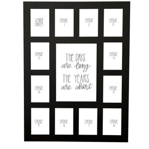 May include: Black picture frame with 12 openings for photos. Each opening is labeled with a grade level, from Kindergarten to Grade 12. The center opening has the text "The days are long, the years are short."