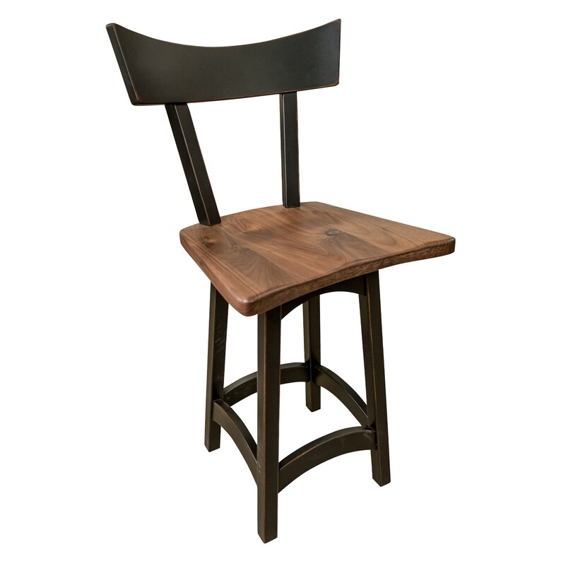 May include: A black wooden bar stool with a curved back and a brown wooden seat. The stool has a simple, rustic design.