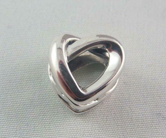 Knotted heart charm sale