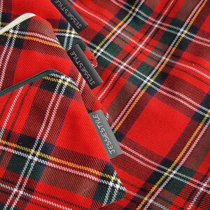 May include: Two red and black plaid fabric pouches with a black label that says "Jessiestyle" on each pouch.