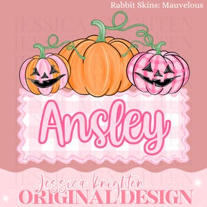 May include: A digital illustration featuring three pumpkins with carved jack-o'-lantern faces. The central pumpkin is orange, flanked by pink pumpkins. The name "Ansley" is displayed in pink script on a white and pink gingham background. The design includes the text "Rabbit Skins: Mauvelous" and "Jessica Knighten ORIGINAL DESIGN."