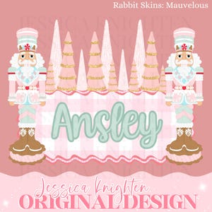 May include: A digital illustration featuring two nutcracker figures flanking a central design. The design includes the name "Ansley" in a teal script, set against a pink and white plaid background, with pink and gold trees above. The words "Jessica Knighten ORIGINAL DESIGN" are at the bottom.
