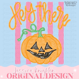 May include: A digital graphic featuring the orange text Hey there above a carved orange pumpkin with a green stem and black facial features. The background consists of vertical pink and white polka dot stripes on a light blue field.