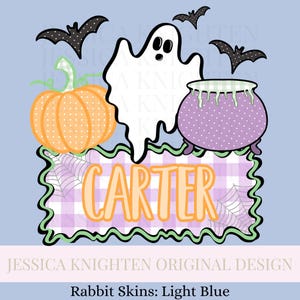 May include: A Halloween-themed graphic with a light blue background. It features a white ghost, orange pumpkin, purple cauldron, and black bats. The name "CARTER" is displayed in orange letters on a purple and white checkered banner.