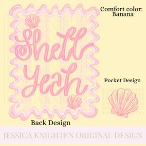 May include: A light yellow design with the words "Shell Yeah" in pink script. The design includes seashell graphics and a wavy border. Text on the image says "Comfort color: Banana" and "Pocket Design".