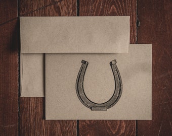 Carte de papeterie pliée de fer à cheval