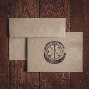 Tarjeta de nota de papelería simple de la brújula