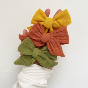 Double Gauze / Muslin Bow on Nylon Headband or Clip image 1