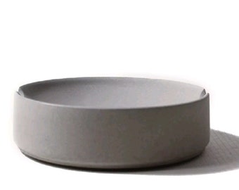 Cenicero minimalista de hormigón gris