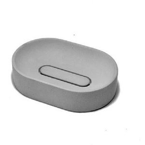 May include: A gray oval-shaped soap dish with a raised, rectangular area in the center.