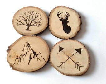 Wood burned coasters on tree slices