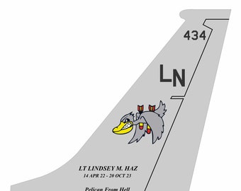 May include: A grey and white aircraft tail with the number 434 and the letters LN. The tail features a cartoon grey duck with a yellow beak and red bombs. The text "LT LINDSEY M. HAZ 14 APR 22 - 20 OCT 23 Pelican From Hell" is below the duck.
