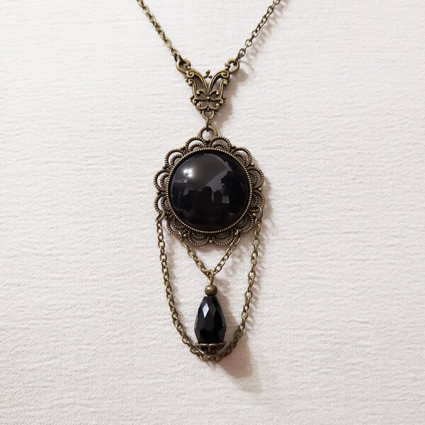 Victorian bronze necklace with black drop crystal and glass cabochon