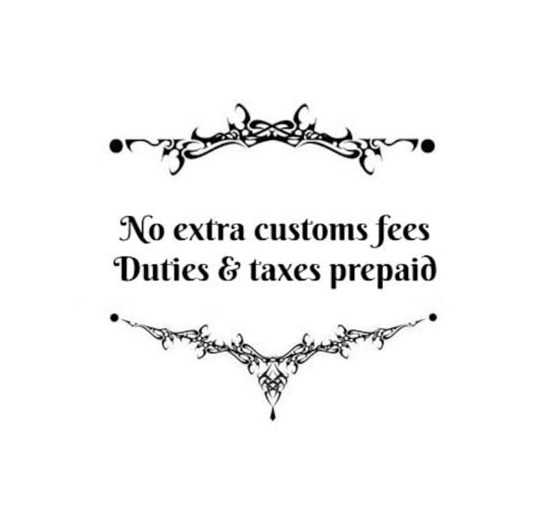 May include: White background with black decorative flourishes at the top and bottom. The text in the center reads "No extra customs fees Duties & taxes prepaid."