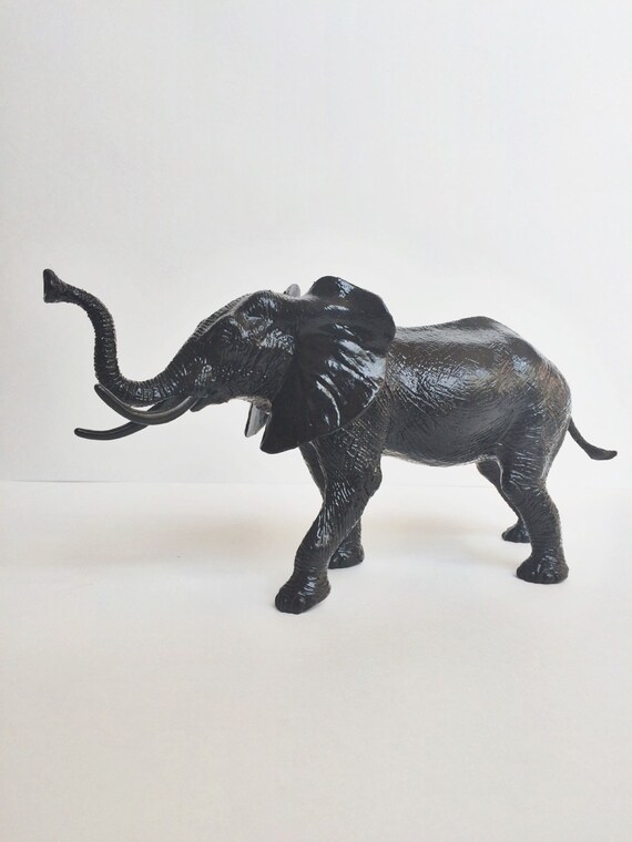 Items similar to Black Elephant Figurine on Etsy