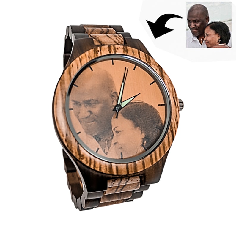 May include: A wooden wristwatch with a personalized photo on the watch face. The watch features a brown and black wood grain design on the band and bezel. The watch face displays a black and white image of a couple.