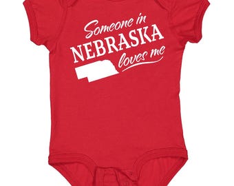 Body de bebé "Alguien en Nebraska me ama" de Inktastic