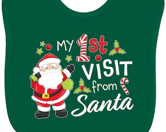 Babero para bebé "Mi primera visita de Papá Noel" de Inktastic