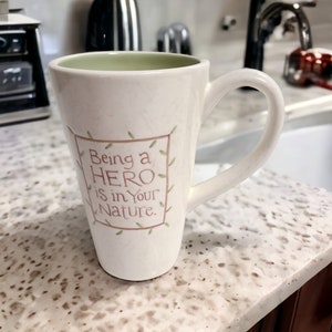 DemDaco &quot;Being a Hero is in Your Nature&quot; 12 Oz Coffee Mug Design by Tom Coffey Microwave & Dishwasher Safe