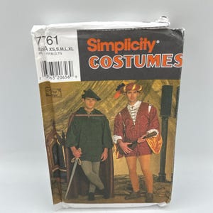 May include: A Simplicity Costumes sewing pattern envelope, number 7761, featuring illustrations of two historical-style outfits. One shows a dark green tunic with a cape and sword, the other a red patterned doublet with a hat and lute.