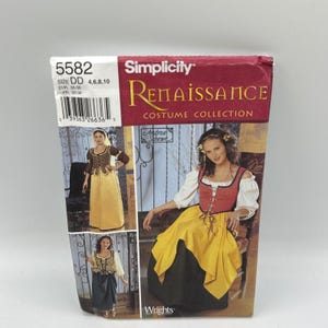 May include: Simplicity 5582 Renaissance Costume Collection sewing pattern envelope. The front displays three images of models wearing bodices, skirts, and white blouses. The text includes the pattern number 5582, size DD 4, 6, 8, 10, and Andrea Schewe.