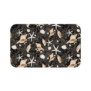 May include: A black background with a repeating pattern of seashells, starfish, and seaweed. The seashells are beige and brown, and the starfish are white. The seaweed is a dark green.