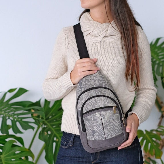 gray sling bag
