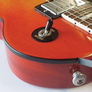 Gitarrpinnar i vinyl, skalbart och självhäftande klistermärke med ränder för gitarrer och basar, 7 färgalternativ