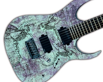 May include: An electric guitar body featuring a light mint green and purple mottled finish with a black graphic print of insect-like skeletons. The instrument includes two black EMG humbucker pickups, a black bridge, and a single silver volume knob.