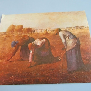 May include: A print of a painting depicting three figures harvesting wheat in a field. The figures are dressed in work clothes and are bent over, gathering the wheat. The background shows haystacks and other workers.