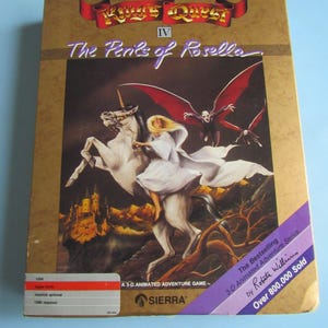 May include: A rectangular video game box for King's Quest IV: The Perils of Rosella. The cover features a blonde figure riding a white unicorn, a winged creature, and a castle. Text includes 'Sierra', 'A 3-D Animated Adventure Game', and 'Over 800,000 Sold'.