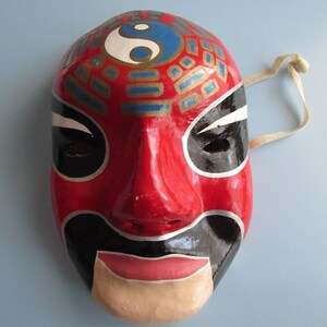 File:Paper mache mask with feet, front view with red background.JPG -  Wikipedia
